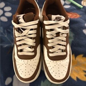 Nike woman’s White and Brown Sneakers